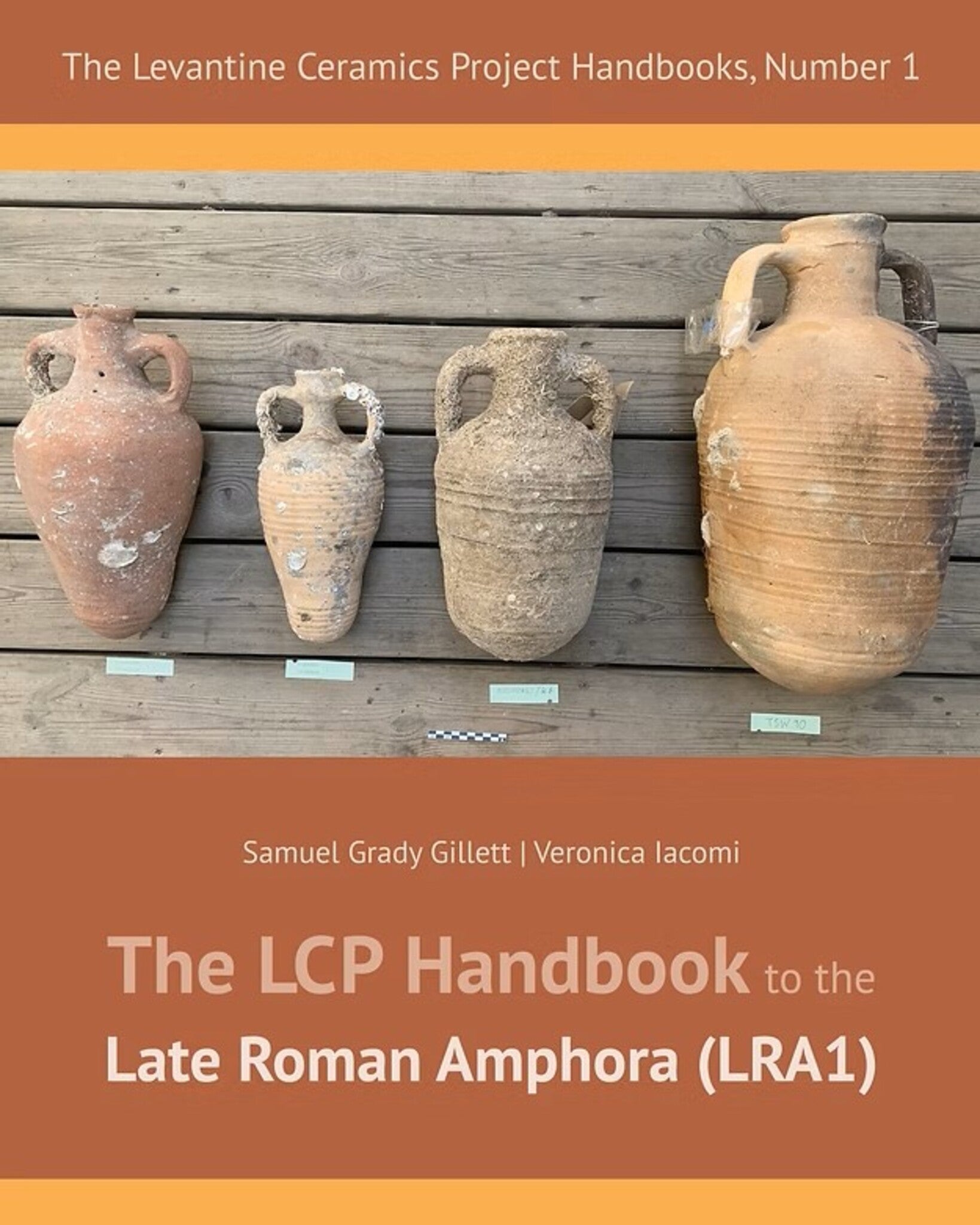 Book cover of 'The LCP Handbook to the Late Roman Amphora (LRA1)' with ceramic jars on a wooden background